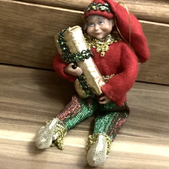 Santa's Workshop Other - Santa's Workshop Cloth Doll Ornament Holding wrapped gift in gold color #96002